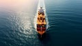 cargo ship full of standard shipping containers at the sea during shipping at day time Royalty Free Stock Photo