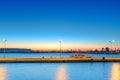 Cargo ship in the harbor at sunset Royalty Free Stock Photo