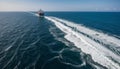Cargo ship leaving waves trail Royalty Free Stock Photo