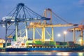 Cargo ship loading cargo container with crane at port Royalty Free Stock Photo