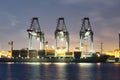 Cargo ship loading cargo container with crane at port Royalty Free Stock Photo