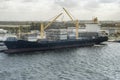 Cargo ship loading containers at the port of Fort Lauderdale, FL Royalty Free Stock Photo