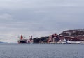 Cargo ship loading iron ore at the Port of Narvik in northern Norway on a winter day