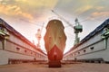 Front ship moored in floating dry dock yard with sunset background Royalty Free Stock Photo