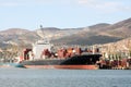 Cargo ship moored to the pier in the port of Novorossiysk, Russia.