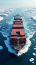 Cargo Ship Navigating Through Icy Waters with Chunks of Ice Visible Around Royalty Free Stock Photo