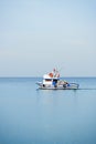 Cargo ship navigating the waters of the Bosphorus Strait passing under Royalty Free Stock Photo