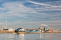 Cargo ship on the Nederrijn passing the Dutch Kleefse Waard industrial area in Arnhem