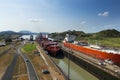 Cargo ship and a oil tanker in the Miraflores Locks in the Panama Canal, in Panama Royalty Free Stock Photo