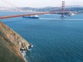 Cargo Ship Passing Under the Golden Gate Bridge Royalty Free Stock Photo