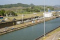 Cargo ship passing through Panama Canal Royalty Free Stock Photo