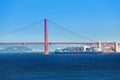 Cargo ship passing under Golden Gate Bridge, USA Royalty Free Stock Photo
