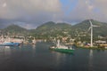 Cargo ship, port, mountains and clouds. Victoria, Mahe, Seychelles