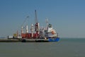 Cargo ship on river Tagus in the harbor of Lisbon