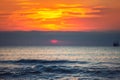 Cargo ship sailing in the sea, beautiful sunrise landscape Royalty Free Stock Photo