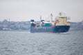 A cargo ship sails with the sea in the distance,delivery of goods, transport