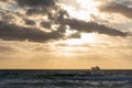 Cargo Ship on sea in a Cool Morning Sunrise in Miami South Beach, Florida