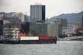 Cargo Ship in sea of Victoria Harbour between Kowloon and Hong Kong island sailing go to ocean