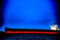Cargo ship in sea waters Royalty Free Stock Photo