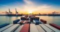 Cargo Ship with Shipping Containers Approaching Port at Sunset. Royalty Free Stock Photo