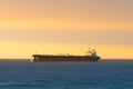 Cargo ship at sunset in the coasts of Chile