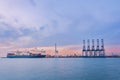 Cargo ship in Trade Port , Container loading Shipping by crane Royalty Free Stock Photo