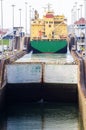 Cargo ship transiting the Miraflores locks in the Panama Canal Royalty Free Stock Photo