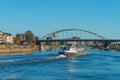 Cargo ship underneath Wilhelmina bridge, river IJssel near Deventer