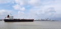 Cargo ship underway through river to New Orleans