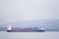 Cargo ship vessel freight containers carrier transport on sea ocean to port dock