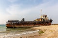 Cargo ship wreck run aground on the Al Hamriyah beach in Umm Al Quwain, United Arab Emirates