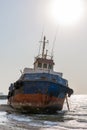 Cargo ship wreck washed ashore on the Al Hamriyah beach in Umm Al Quwain, United Arab Emirates