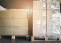 Cargo shipment boxes, Manufacturing and warehousing. Stacked of package on pallet at storage warehouse. Royalty Free Stock Photo