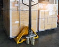 Cargo shipment boxes. Stacked of cardboard boxes on pallet rack at the warehouse storage. Manufacturing and warehousing. Royalty Free Stock Photo