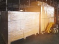 Cargo shipment boxes. Stacked of cardboard boxes wrapping plastic film on pallet rack. Warehouse storage. Royalty Free Stock Photo