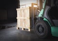 Cargo shipment, Freight truck, Warehousing and Delivery service. Forklift loading crate wooden into cargo container truck.