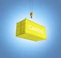 Cargo shipping container in yellow with an inscription delivery loading concept the crane lifts the container on blue gradient Royalty Free Stock Photo