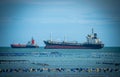 Cargo ships anchor in front of the bay of Si Racha District, Thailand Royalty Free Stock Photo