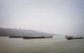 Cargo ships on Danube river surprised by bad weather Royalty Free Stock Photo