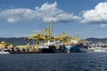 Cargo ships docked at Pier VII of the Port of Trieste loading:unloading containers Royalty Free Stock Photo