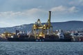Cargo ships docked at Pier VII of the Port of Trieste loading:unloading containers Royalty Free Stock Photo