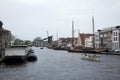 Cargo ships and houseboats docked in the canals of Leiden