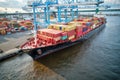 Cargo Ships Loaded with Cargo Sitting in Port