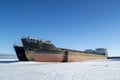 Cargo ships at the port in the winter parking Royalty Free Stock Photo