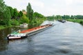 Cargo ships on a river