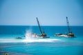 Cargo ships on the roads, coastline. Royalty Free Stock Photo