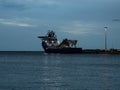 Cargo supply ship with crane on board Royalty Free Stock Photo