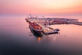 Cargo terminal loading shipping containers onto cargo ships, aerial footage, hyperlapse, Vancouver, BC, Canada, marine Royalty Free Stock Photo