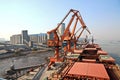 Cargo terminal for unloading grain cargo by coastal cranes. Port Jiangyin, China Royalty Free Stock Photo