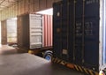 Cargo trailer truck parked loading at dock warehouse. Cargo shipment. Industry freight truck transportation. Royalty Free Stock Photo